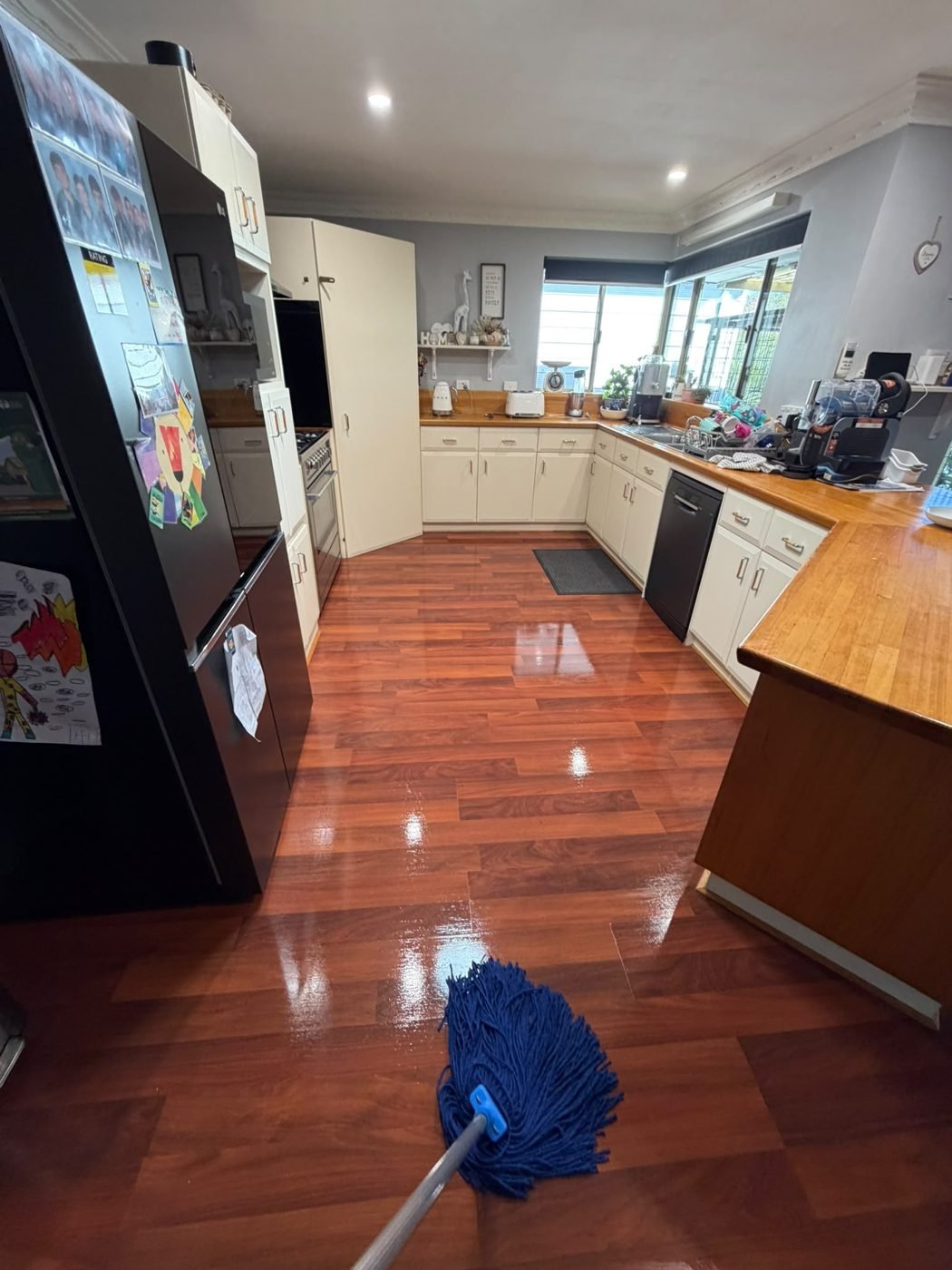 Kitchen floor — mopped & shining